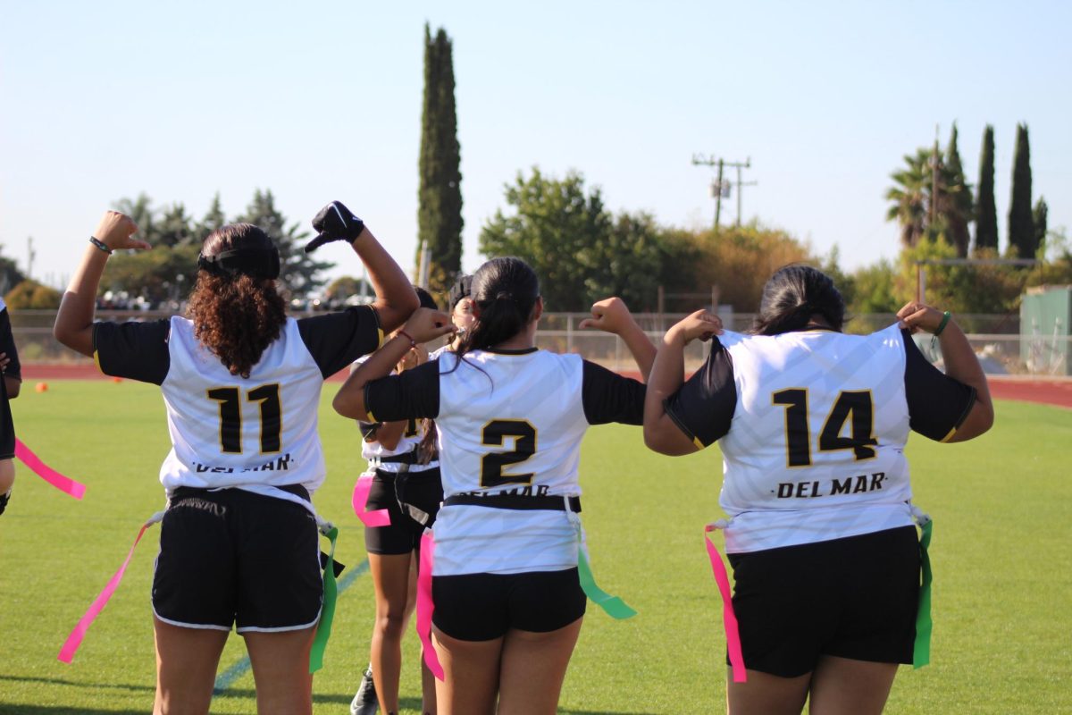 The flag football, showing off their new jerseys, Sep 25.