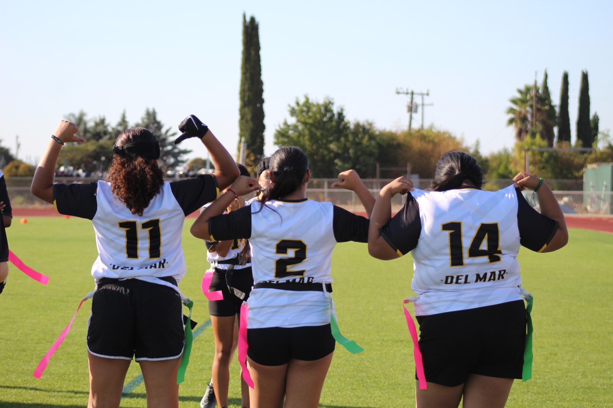 The flag football, showing off their new jerseys, Sep 25.