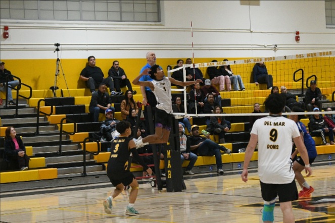 Jayvohn Johnson does his approach to hit the ball.