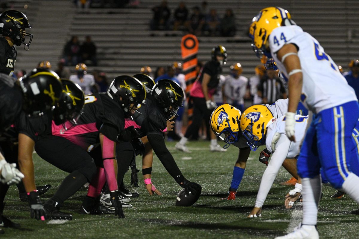 Dons face to face with Eagles before the ball is snapped.
