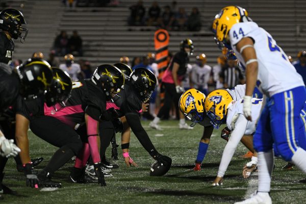 Dons face to face with Eagles before the ball is snapped.