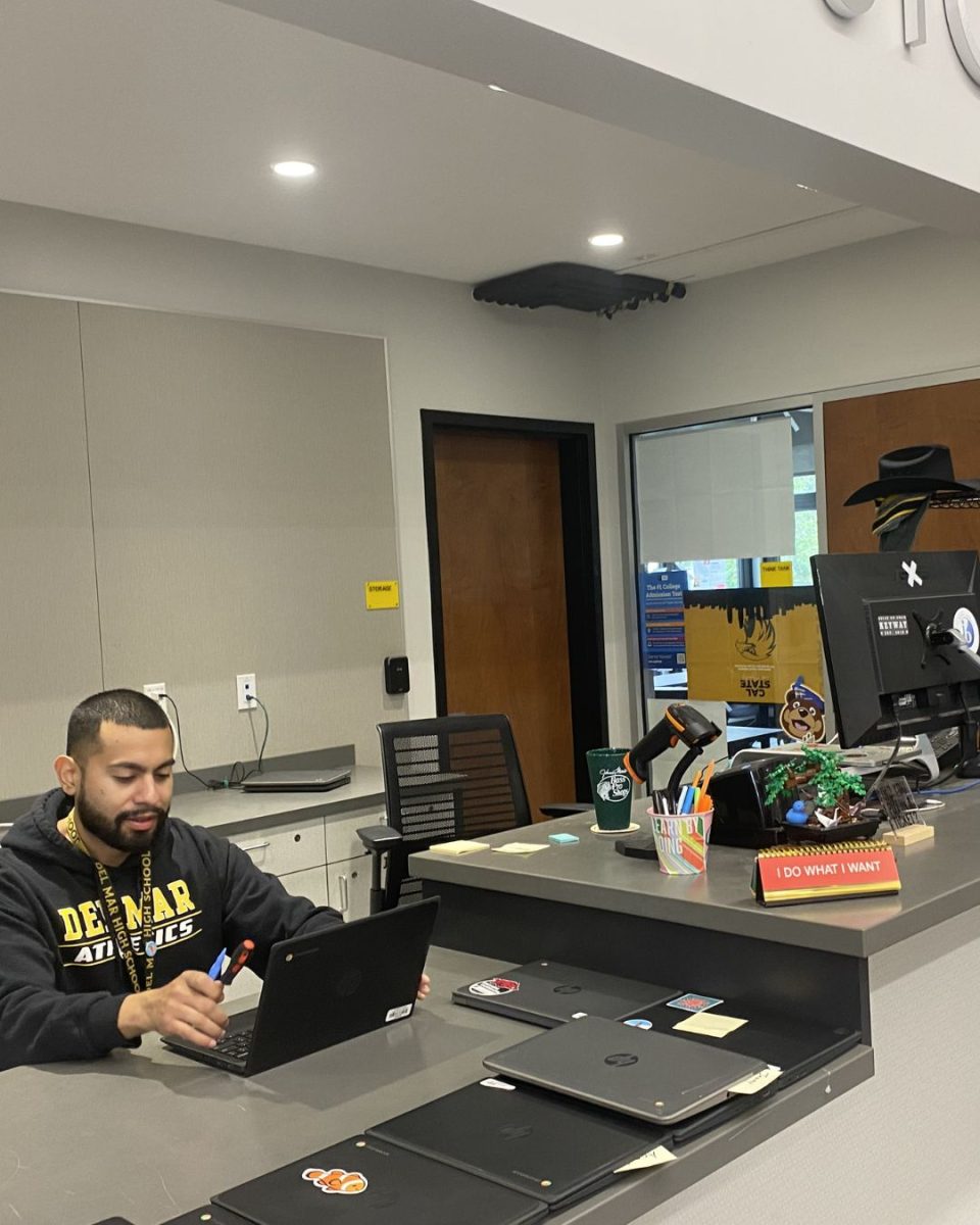 Alex Blanco on his laptop in the Tech Center.