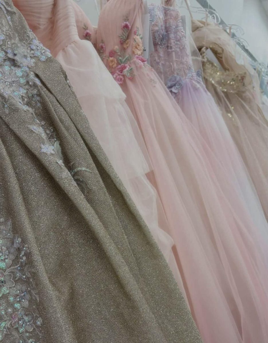 Racked quinceañera dresses at a local dress shop. 