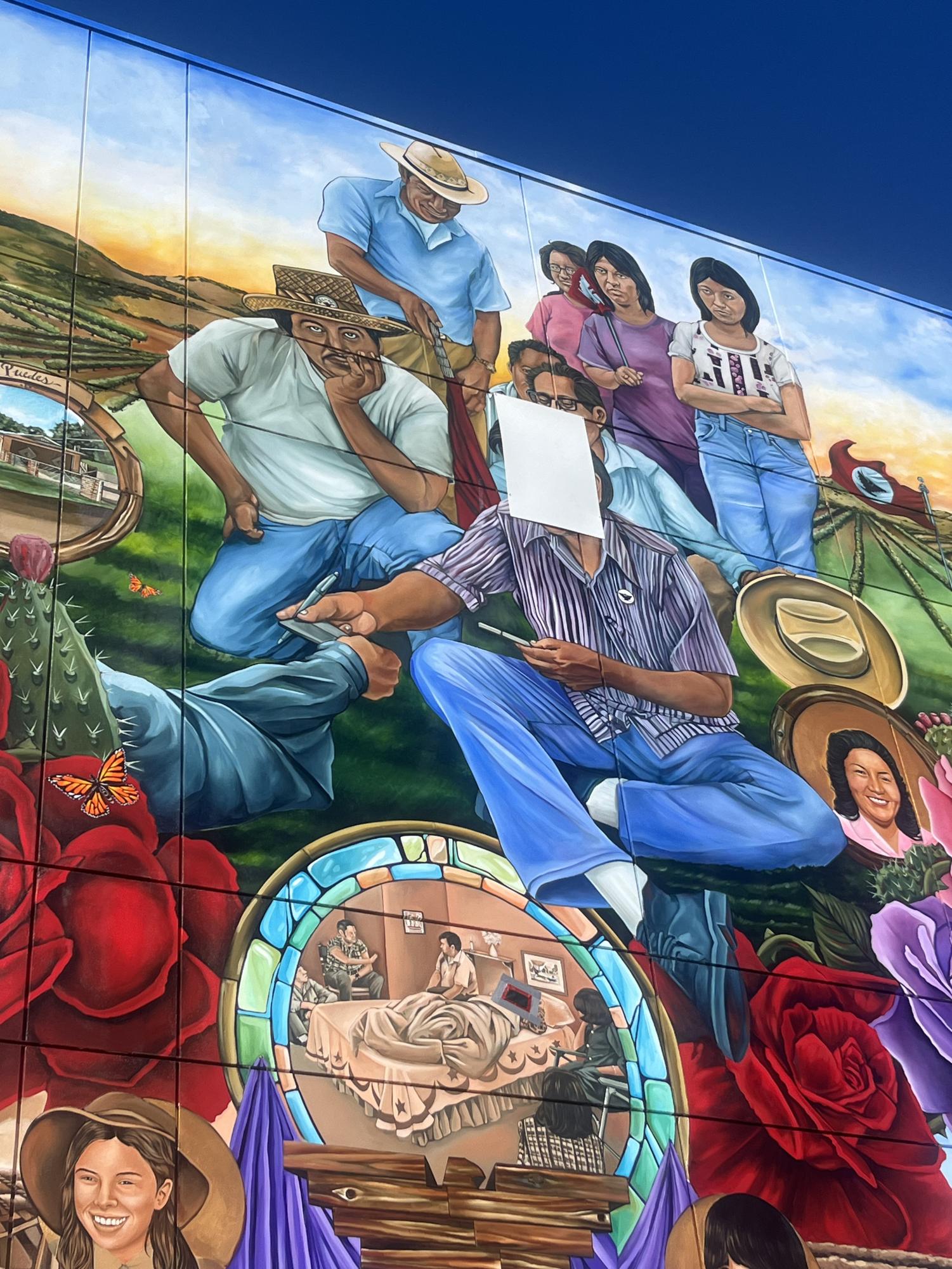San Jose City College's "Cesar E. Chavez Library" mural, now with a cover over Chavez' face